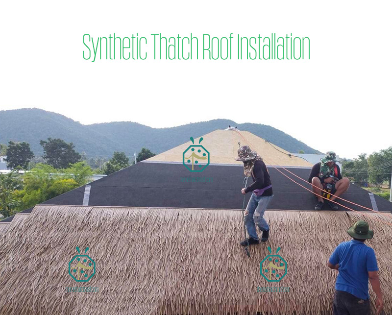 Durable Straw Thatched Roof Installation by Workers
